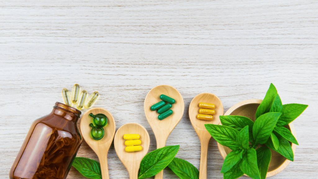 A supplement bottle placed among herbal liver detox ingredients, representing HepatoBurn’s formula.
