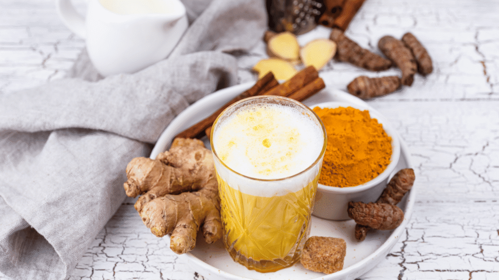 HepatoBurn bottle surrounded by natural liver-supporting ingredients like milk thistle, turmeric, beetroot, and dandelion on a clean white background.