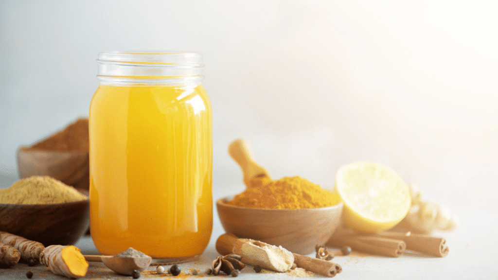 Infographic showing the HepatoBurn supplement bottle at the center with icons of key ingredients like milk thistle, turmeric, beetroot, and berberine.